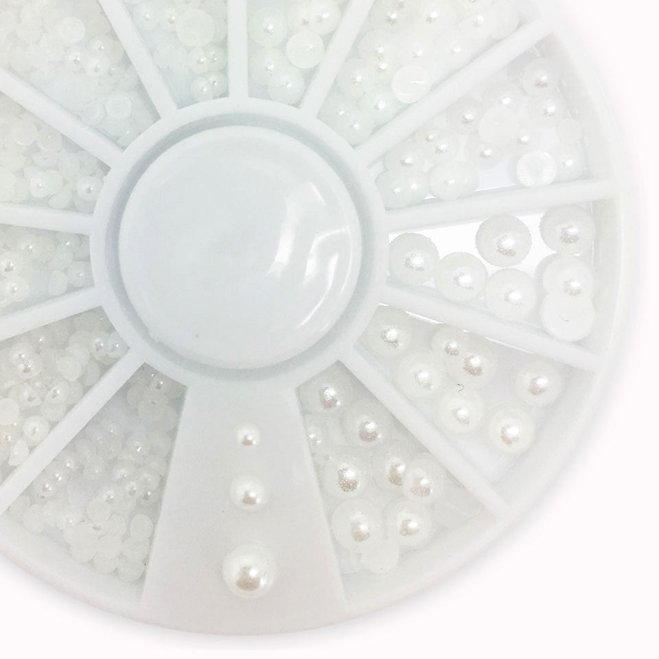 White Nail Pearl Half-Rounds Mixed Sizes. Beautiful pearls, flat-backed for easy sticking.