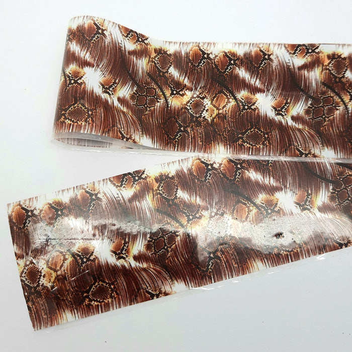 Brushed Snakeskin Nail Foil. A gorgeous design in brown and white.
Supplied in 4cm x 100cm lengths.