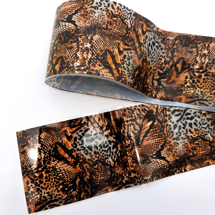 Animal Print and Snakeskin Nail Foil. A gorgeous foil with a mix of dark and light animal print.
Supplied in 4cm x 100cm lengths.