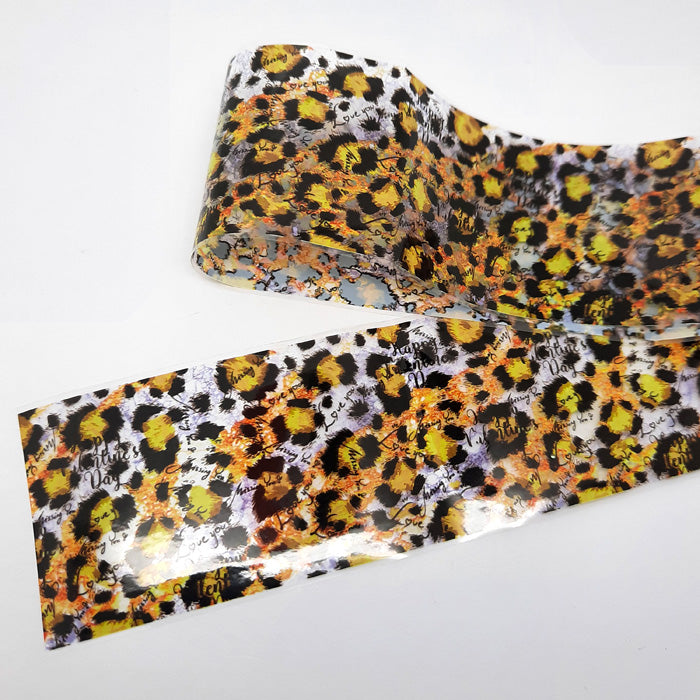 Animal Print Nail Foil with I Love You. I really love this foil, animal print design with tiny love themed words , clear backing.
Supplied in 4cm x 100cm lengths.