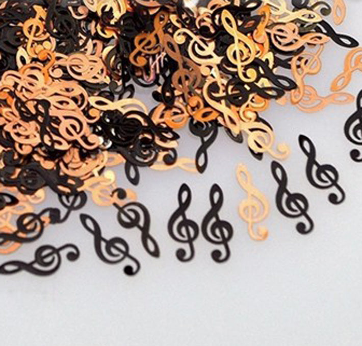 Treble Clef Music Metal Nail Slices x 20. Thin metal, so can easily be bent to fit the curve of your nails. Perfect for music lovers.