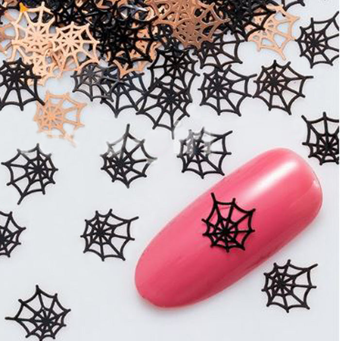 Halloween Spider Web Nail Slices. Gorgeous black metal spider webs. Supplied in packs of 20.