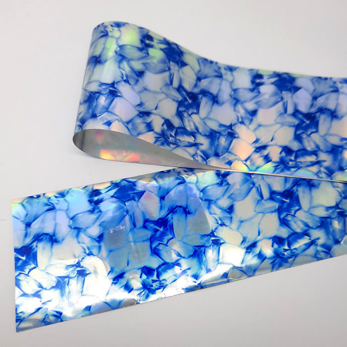 Holo Blue & Silver Marble Nail Transfer Foil. A stunning design.
Supplied in 4cm x 100cm lengths.