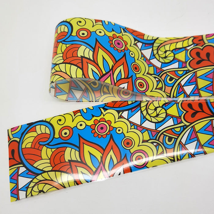 A strip of nail foil in with a funky colourful design.