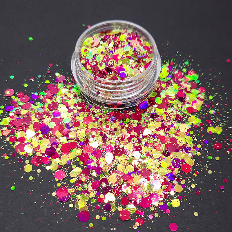 Fuschia + Gold/Lime Nail Glitter 'Carnival'. Carnival is a gorgeous chunky glitter mix, very sparkly, in a mix of dark pink and a gold with a greenish tint.