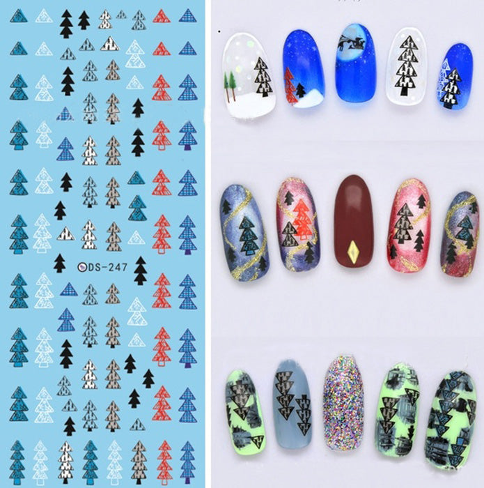 A set of nail art decals featuring various Christmas tree patterns in different colors applied on artificial nails.