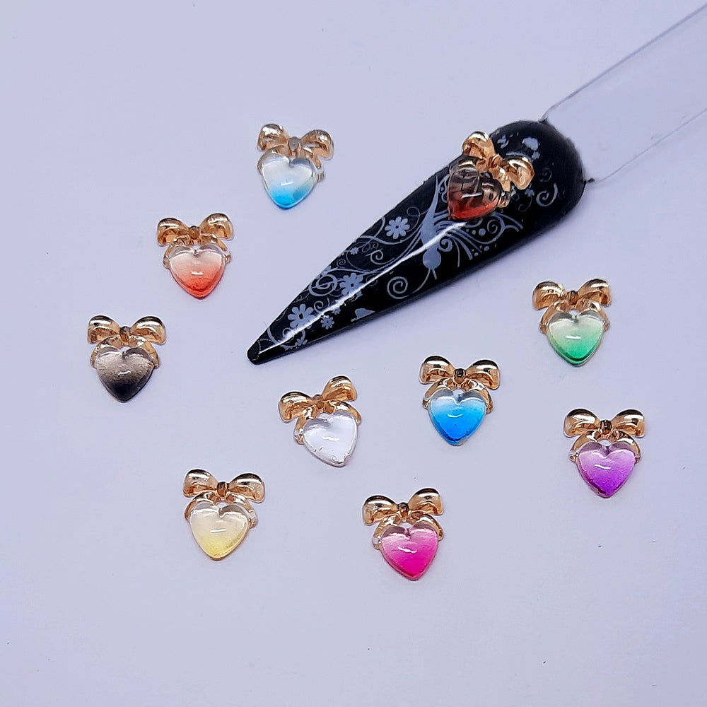 Cute Heart Nail Charms with Bows, lovely hearts with a gold bow on the top
