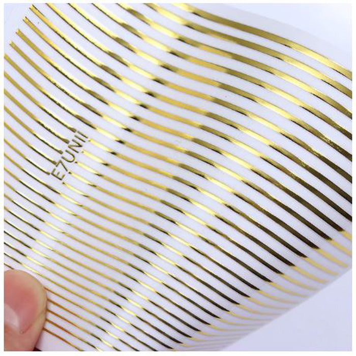 Flexi Nail Tape, Metallic Gold. A sheet of beautiful shiny self adhesive stripes.