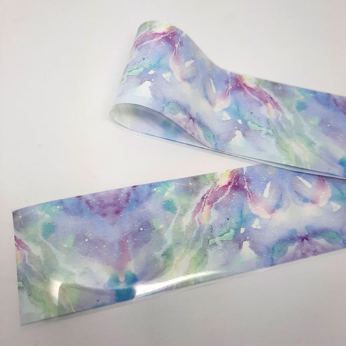 Galaxy Nail Transfer Foil 832-5. Beautiful blues and lilac, the design is a bit like marble.
Supplied in 4cmx 100cm lengths.