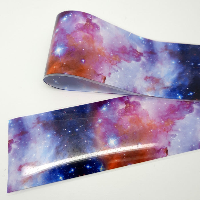 Galaxy Nail Transfer Foil 835-3. Another of my favourite galaxy foils, beautiful colours with stars.
Supplied in 4cm x 100cm lengths.