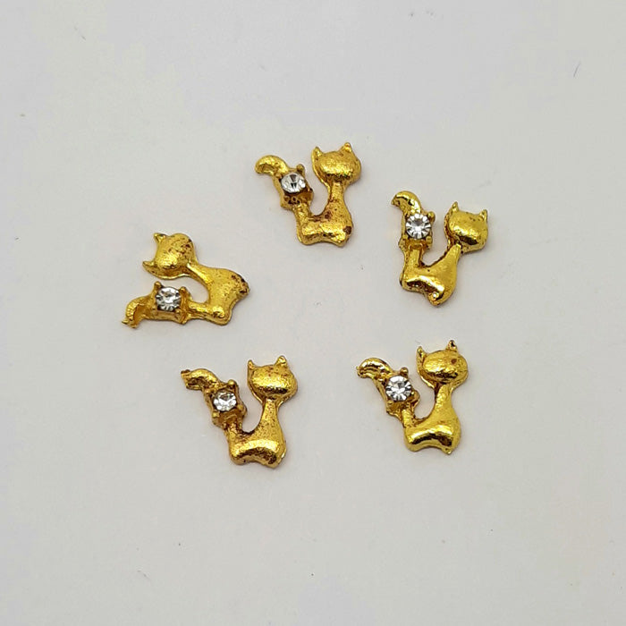 Gold Cat + Rhinestone Nail Charms x 4. Cute sitting cats with a clear gem on the tail.