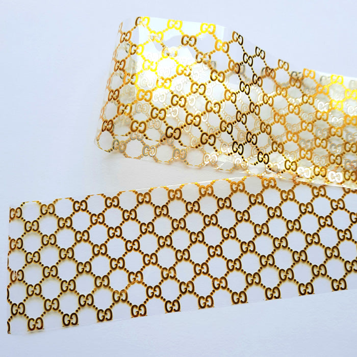 Gold Designer Inspired Nail Foil. Beautiful gold design on clear backing.
Supplied in 4cm x 100cm lengths.
