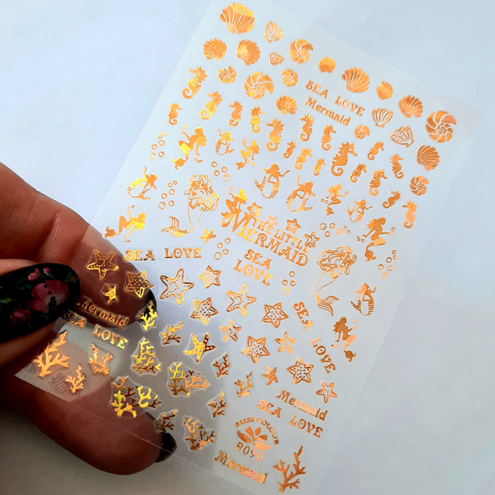 Gold Holo Mermaid Nail Stickers. Adorable designs, and so easy to use.