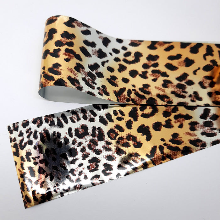 Gold + Silver Metallic Leopard Nail Foil. This is a beautiful foil, and transfers so easily.
Supplied in 4cm x 100cm lengths.