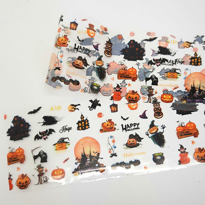 Halloween Nail Foil #5. Lots of spooky designs on a clear backing.
Supplied in 4cm x 100cm lengths.