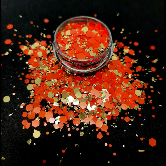 'The Midas Touch' Nail Glitter, Orange Beautiful orange hexagons with a satin sheen amongst shiny gold dots and gold flake pieces. The hexagons are of mixed sizes.