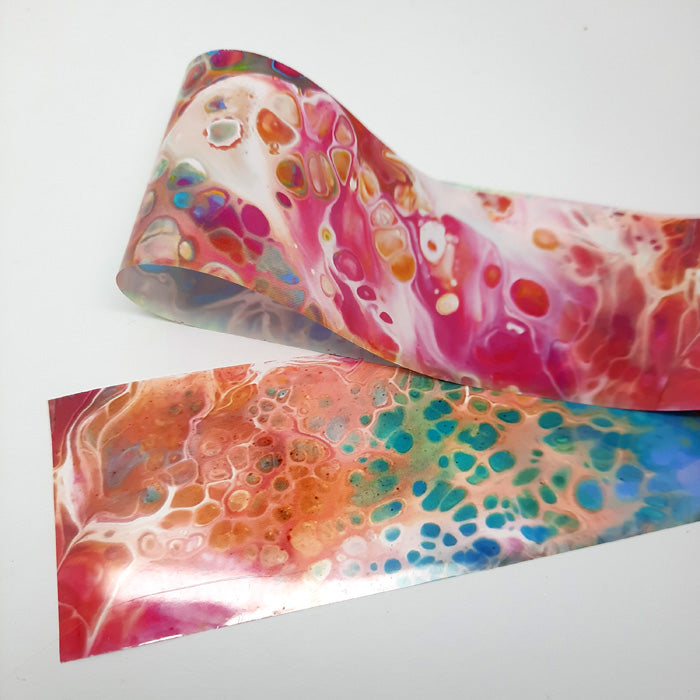 Marbled Ink Nail Transfer Foil. A beautiful colourful nail foil.
Supplied in 4cm x 100cm lengths.