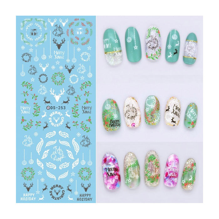A set of Christmas-themed nail decals featuring various designs including reindeer, snowflakes, and festive patterns in multiple colors.