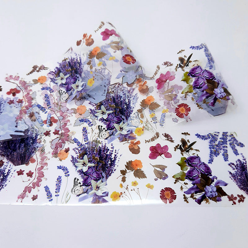 Colourful floral nail art foil on a white background