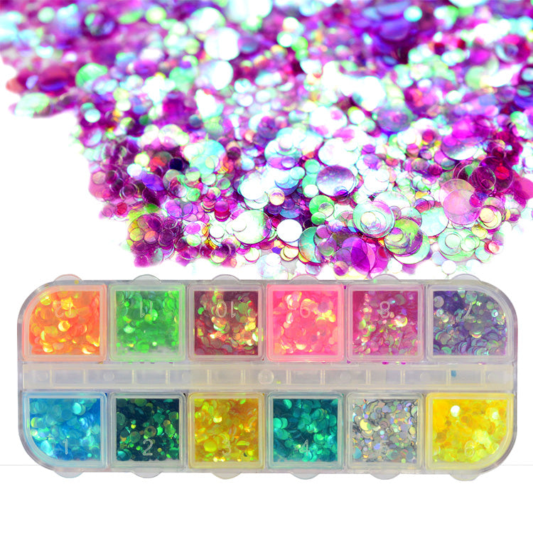 12 x Set Box Mermaid Nail Glitter. 12 beautiful shimmering colours in the case.