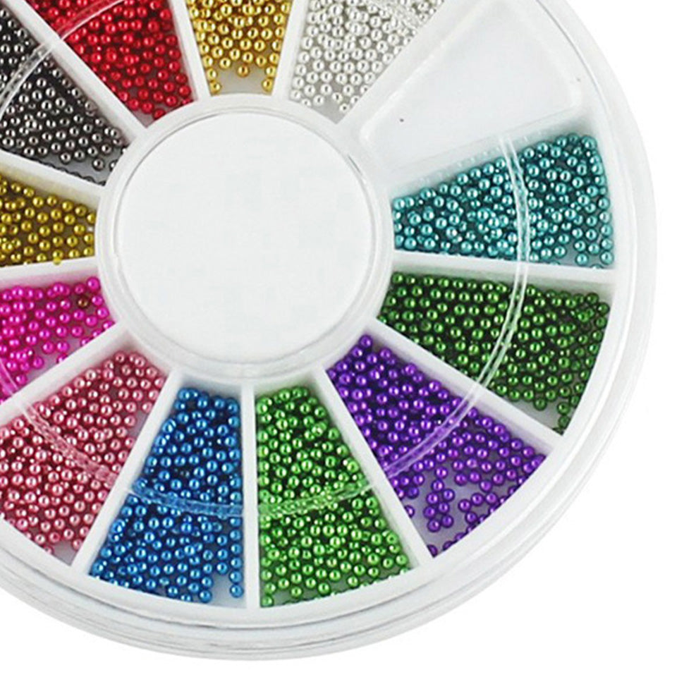Metallic Caviar Beads, Reduced - Colours Mixed Up. Beautiful metallic nail beads in a mix of colours. These are reduced in price as they've all migrated into the wrong segments of the wheel. A bargain.