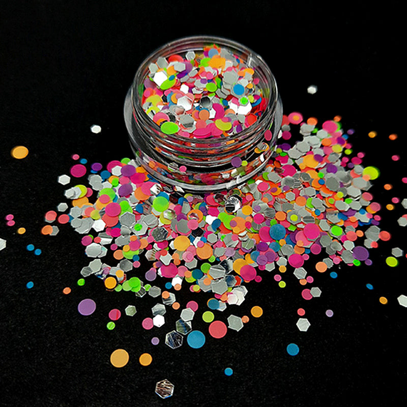 Neon Dots + Silver Hexagons Nail Glitter. Such a gorgeous nail glitter. The neon dots are matt, and the silver hexagons are shiny. Both are in a mix of sizes.