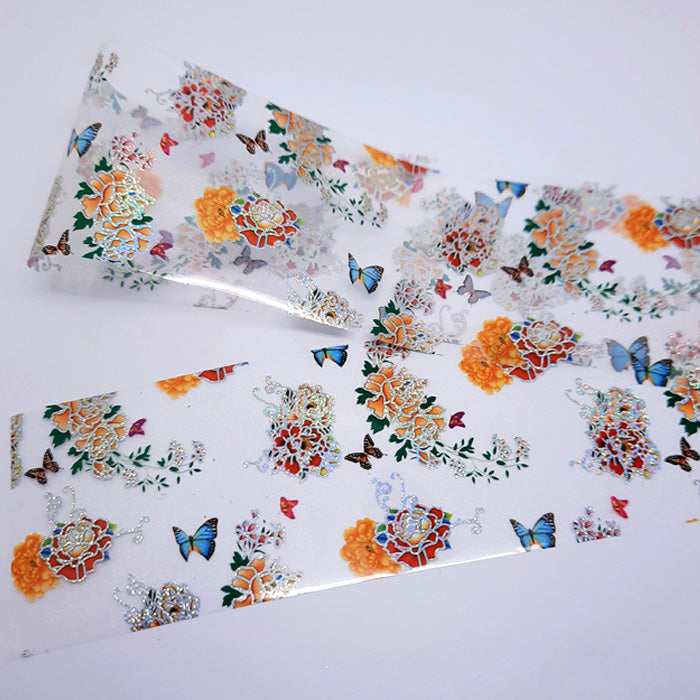 Beautiful Oriental Flower + Butterfly Nail Foil. Stunning designs on a clear shimmery backing.
Supplied in 4cm x 100cm lengths.