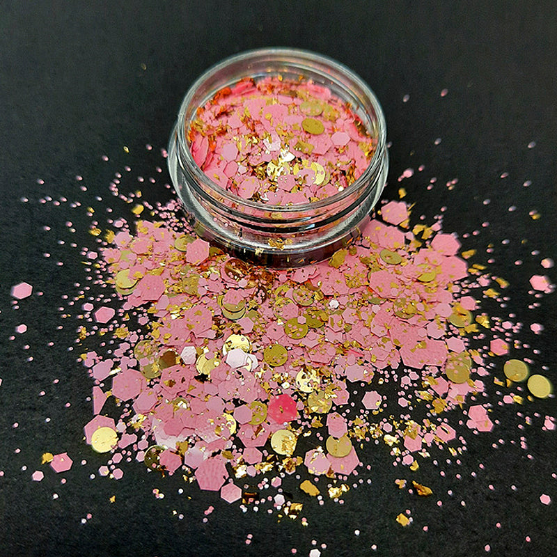 'The Midas Touch' Nail Glitter, Pink. A stunning pastel nail glitter. Pastel pink hexagons of mixed sizes amongst shiny gold dots and gold flakes.