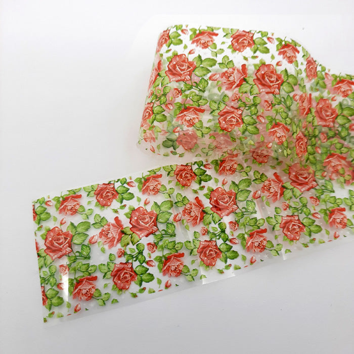 Red Roses + Little White Stars Nail Foil. The designs on this foil are so very beautiful. Clear backing.
Supplied in 4cm x 100cm lengths.