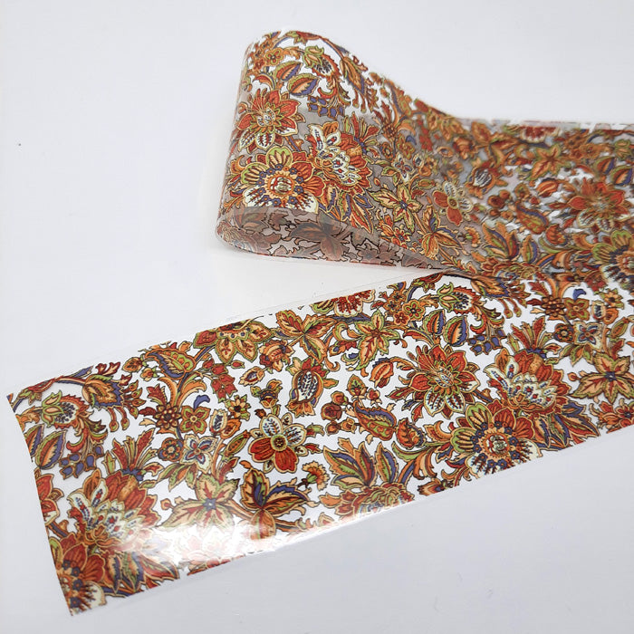 A nail foil with beautiful designs on a clear backing. Looks like a tapestry.