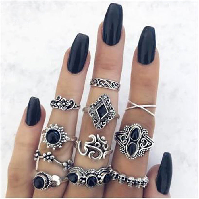 Silver + Black Ring Set, 11 pcs Costume jewellery ring set, please note not real silver! The rings may differ slightly from those in the photos, but the general look and vibe is the same.
Props for your nail pics!