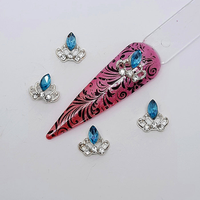 Silver Crown + Blue Gem Nail Charms. Gorgeous silver crowns with a large blue gem and some smaller clear ones.