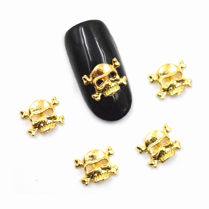 Gold Skull + Crossbones Nail Charms, gorgeous.