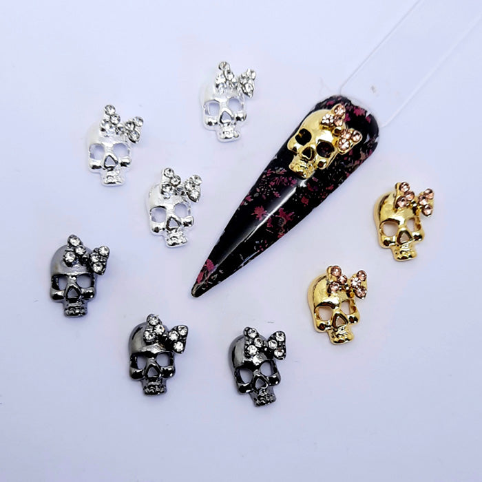 Lot de 4 breloques pour ongles en forme de crânes et de nœuds, 3 couleurs