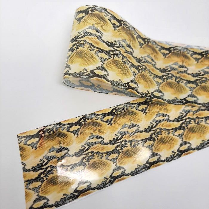 Snakeskin Nail Foil, Black + Browns. This nail foil is beautiful, and in natural colours.
Supplied in 4cmx 100cm lengths.
