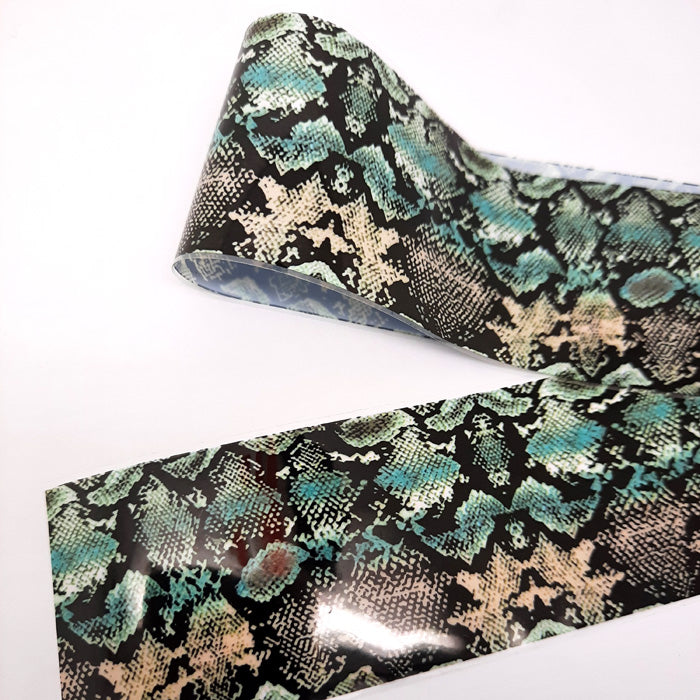 Snakeskin Nail Foil, Black, White + Teal, a beautiful foil.
Supplied in 4cm x 100cm lengths.