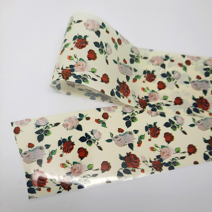 Traditional Red + White Roses Nail Foil. What a beautiful foil this is, covered in red and white roses and leaves, on a creamy white backing. Perfect for all your Valentines, Spring and Summer nails.
Supplied in 4cm x 100cm lengths.