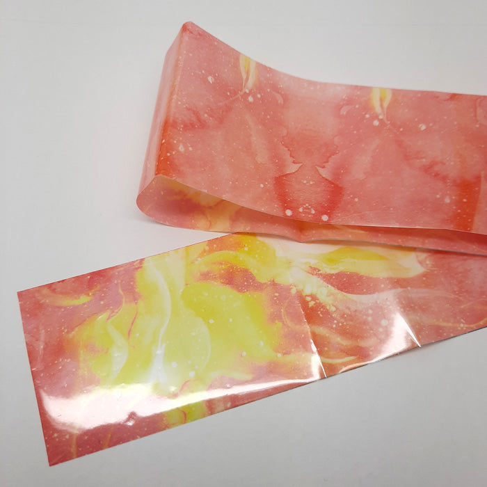 Sunset Nail Transfer Foil, in peachy oranges and yellows, just like a sunset.