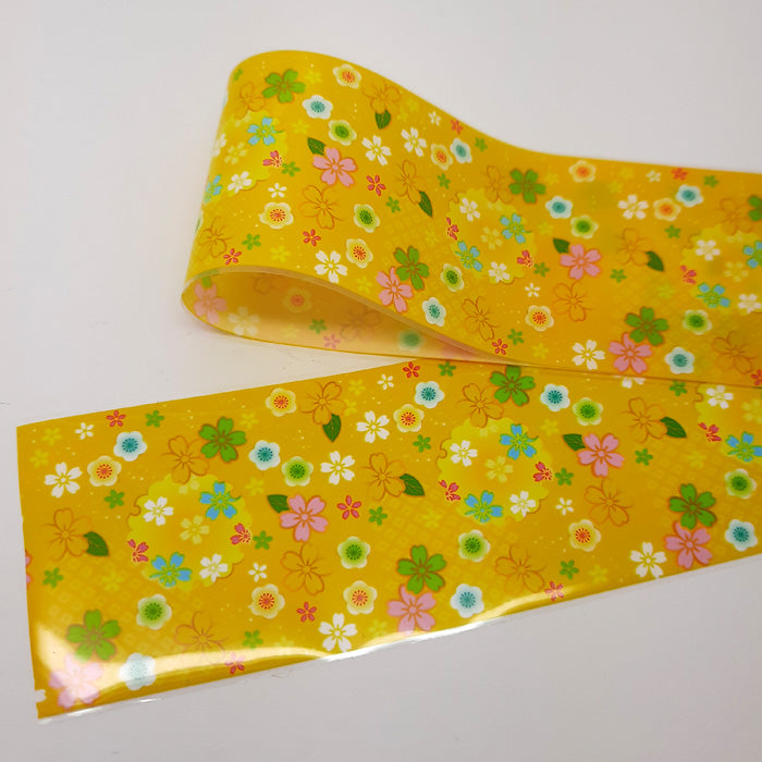 Yellow Nail Foil with Pretty Flowers on a white background