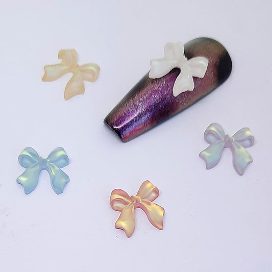 Pretty Aurora Nail Art Charms x 10. These are beautiful; pretty subtle colours with a satin effect. Flat backed. Comes in a pack of 10 mixed colours.