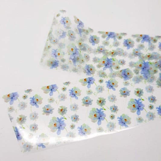 Floral-patterned nail foil with blue flowers on a white background
