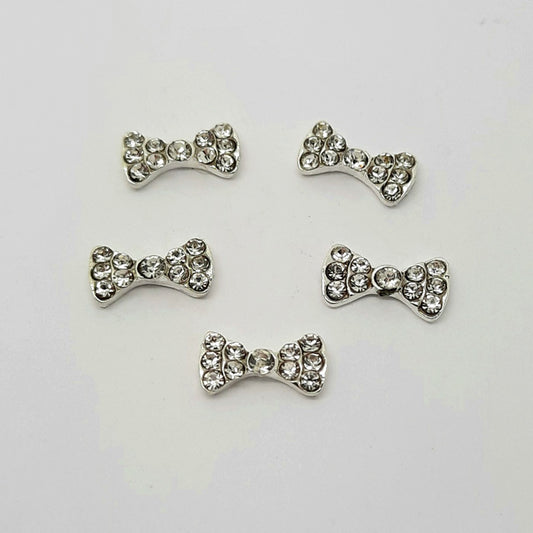 Breloques pour ongles en forme de nœud en argent et strass x 4