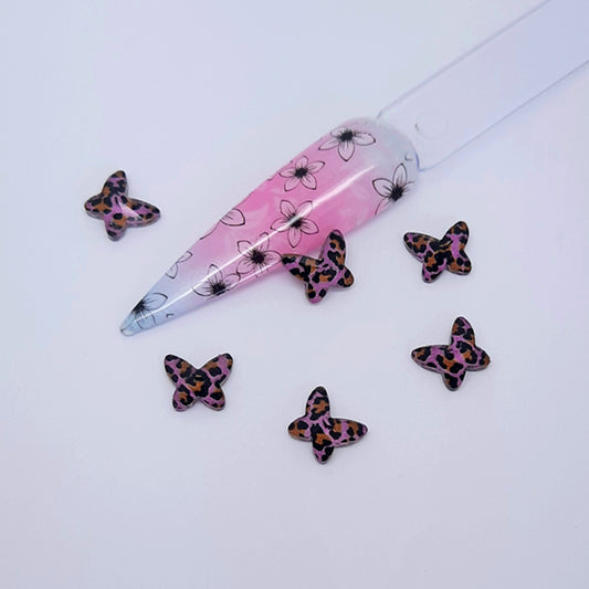 Clear Resin Animal Print Butterfly Charms x 4, Pink. Beautiful butterflies. Other colours also available, plus matching heart charms.