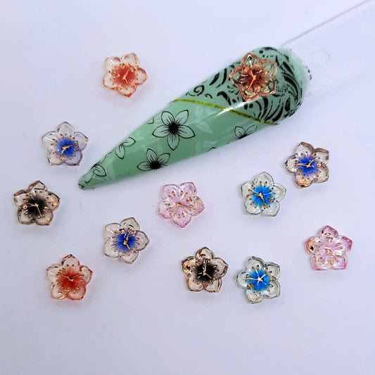 Clock Face Flowers Nail Charms x 10. These are really cute, very popular. Supplied in a mix of colours.