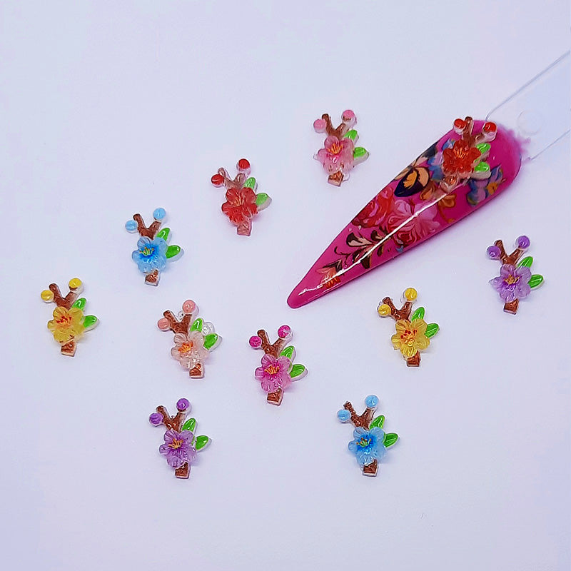 Colorful nail art decorations on a white background