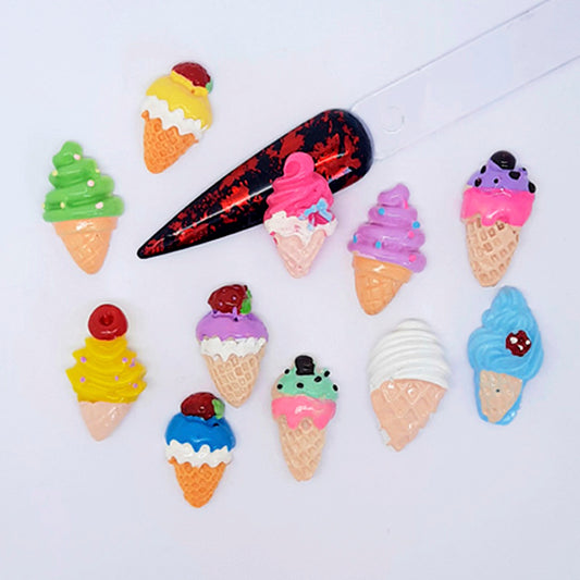 Colourful ice cream cone-shaped nail art charms on a white background