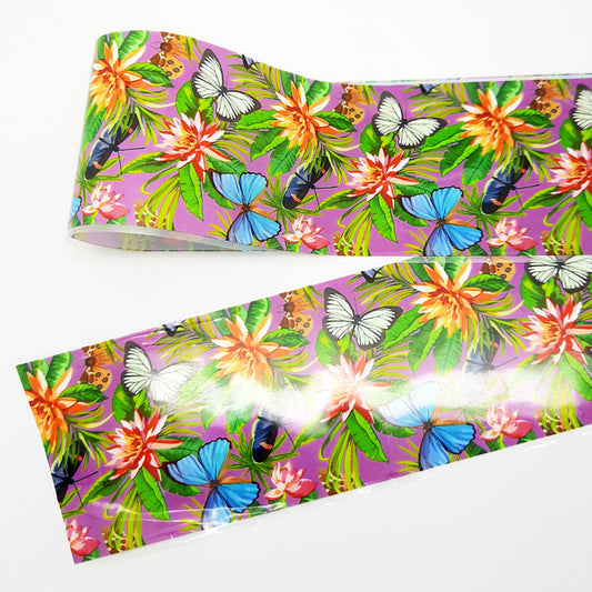 Nail art foil with a colourful floral and butterfly pattern on a white background