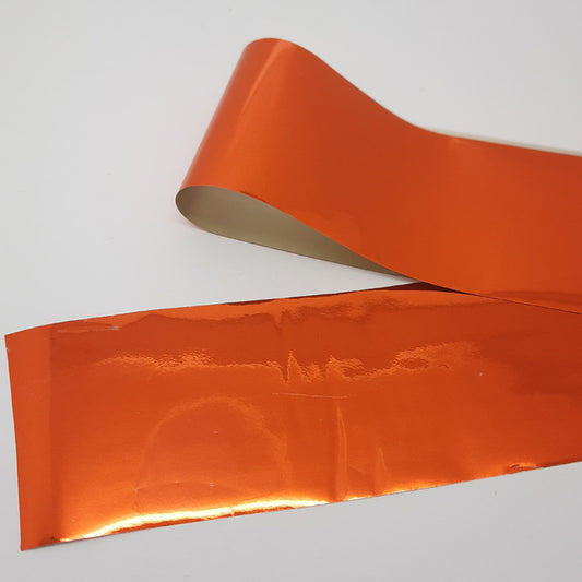 Bright Burnt Gold Nail Foil. A stunning metallic foil, and transfers so easily.

Supplied in 4cm x 100cm lengths.