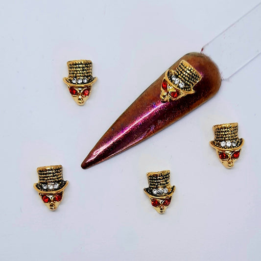 Gold Skull Heads Nail Charms in Hats, x 5. These are lovely and chunky, and so cool.
