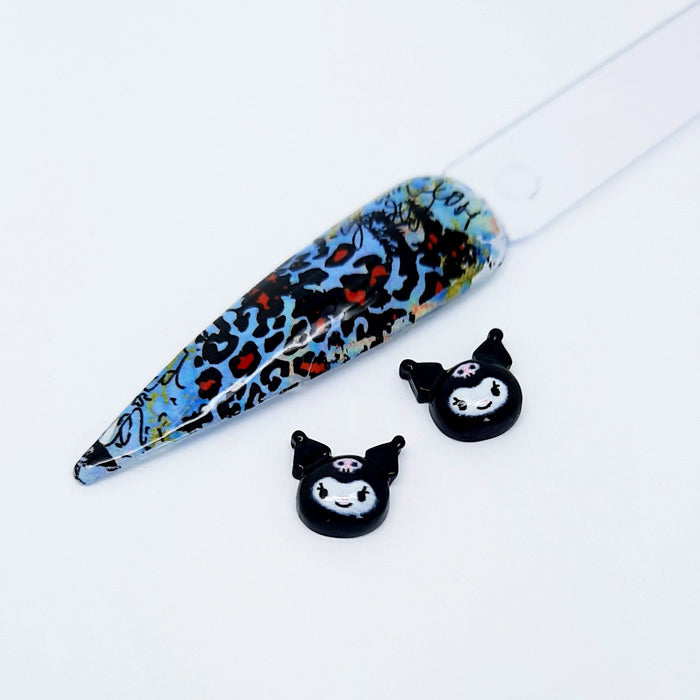 Kuromi Kawaii nail art charms on a white background